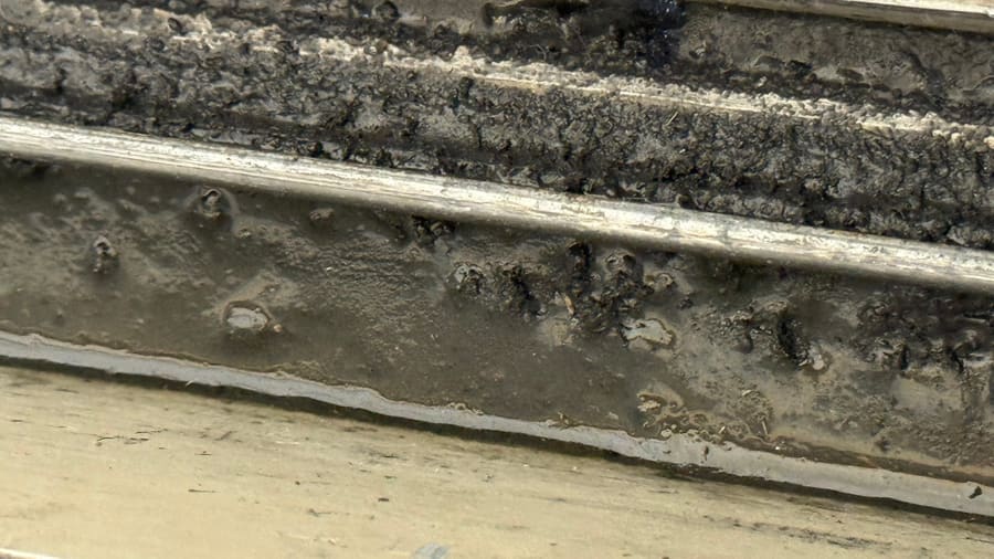Sliding door track with heavy buildup after cleaning did not solve the problem